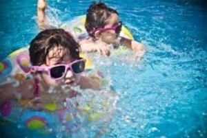 pool maintenance 101 - kids in pool